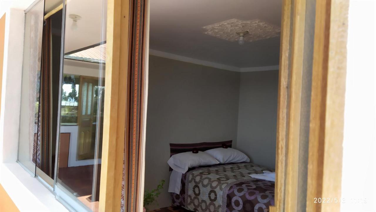 Tikawasi Homestay Comunidad Pueblo Isla Amantani Jose Luis Окосуйо Экстерьер фото